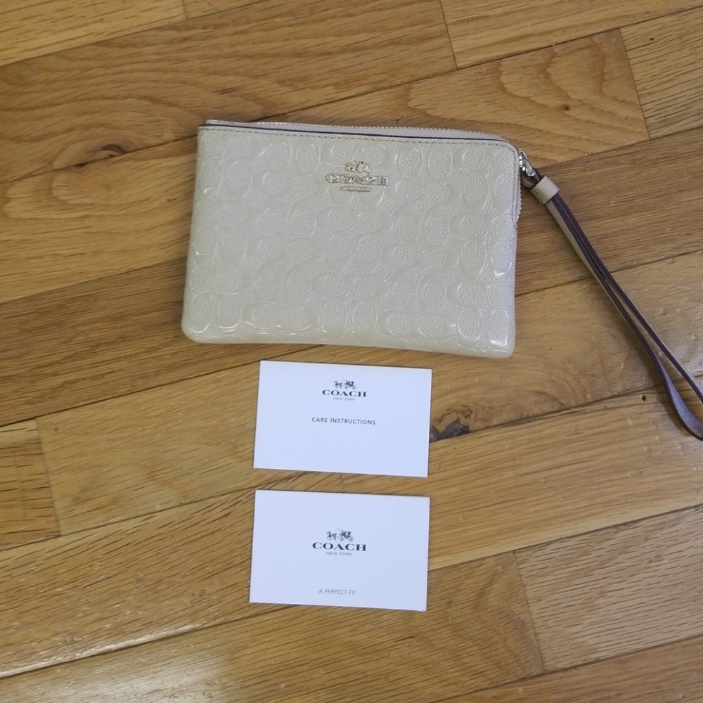 Coach Beige wristlet never used